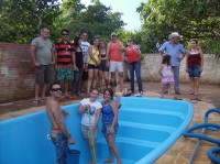 Leni, ao lado da familia e dos amigos